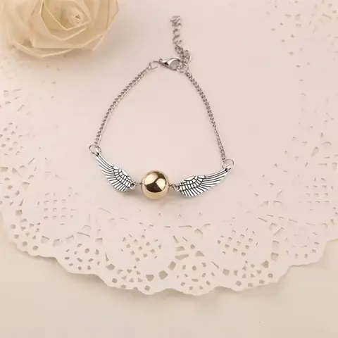 NÁRAMEK Harry Potter Golden Snitch Relikvie smrti Hotoaica ZLATÁ / STŘÍBRNÁ