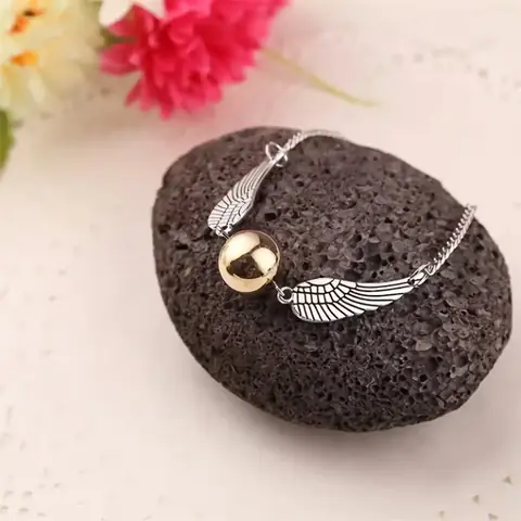 NÁRAMEK Harry Potter Golden Snitch Relikvie smrti Hotoaica ZLATÁ / STŘÍBRNÁ