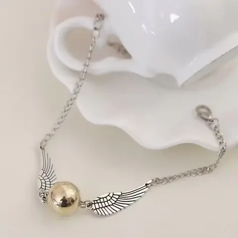 NÁRAMEK Harry Potter Golden Snitch Relikvie smrti Hotoaica ZLATÁ / STŘÍBRNÁ