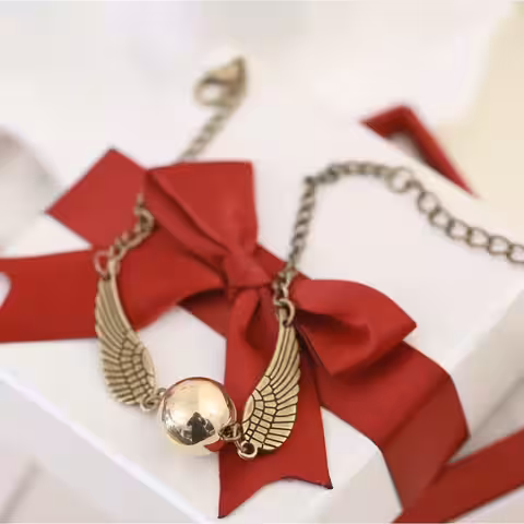 Brățară Harry Potter Brățară tematică din seria Harry Potter – model cu Snitch