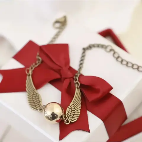 NÁRAMEK Harry Potter Golden Snitch Relikvie smrti Hotoaica ZLATÁ / STŘÍBRNÁ