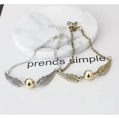 NÁRAMEK Harry Potter Golden Snitch Relikvie smrti Hotoaica ZLATÁ / STŘÍBRNÁ