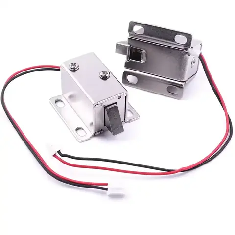 Două yale electromagnetice 12V – vedere laterală Două yale electromagnetice 12V fotografiate din lateral