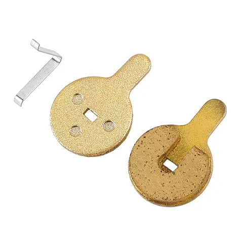 Detaliu plăcuțe frână din cupru Detaliu al plăcuțelor de frână metalice, material cupru